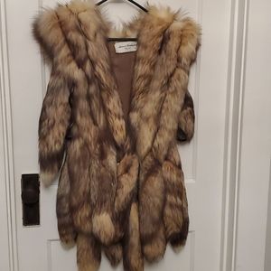 Fur vest with tails